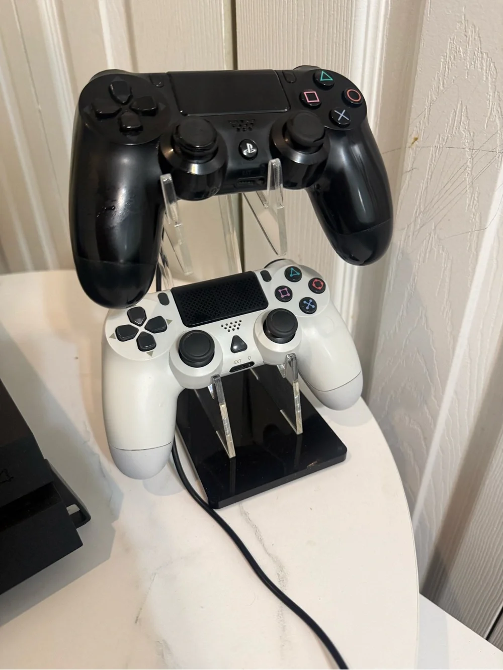 Sony PS4 Console with Black and White DualShock Controllers